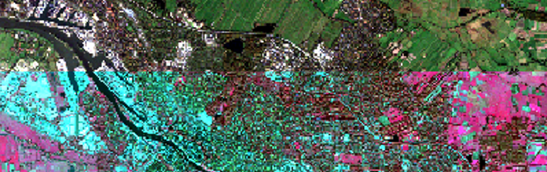 Luftbild einer Landschaft, die teilweise mit blauen und rosa Flächen markiert ist